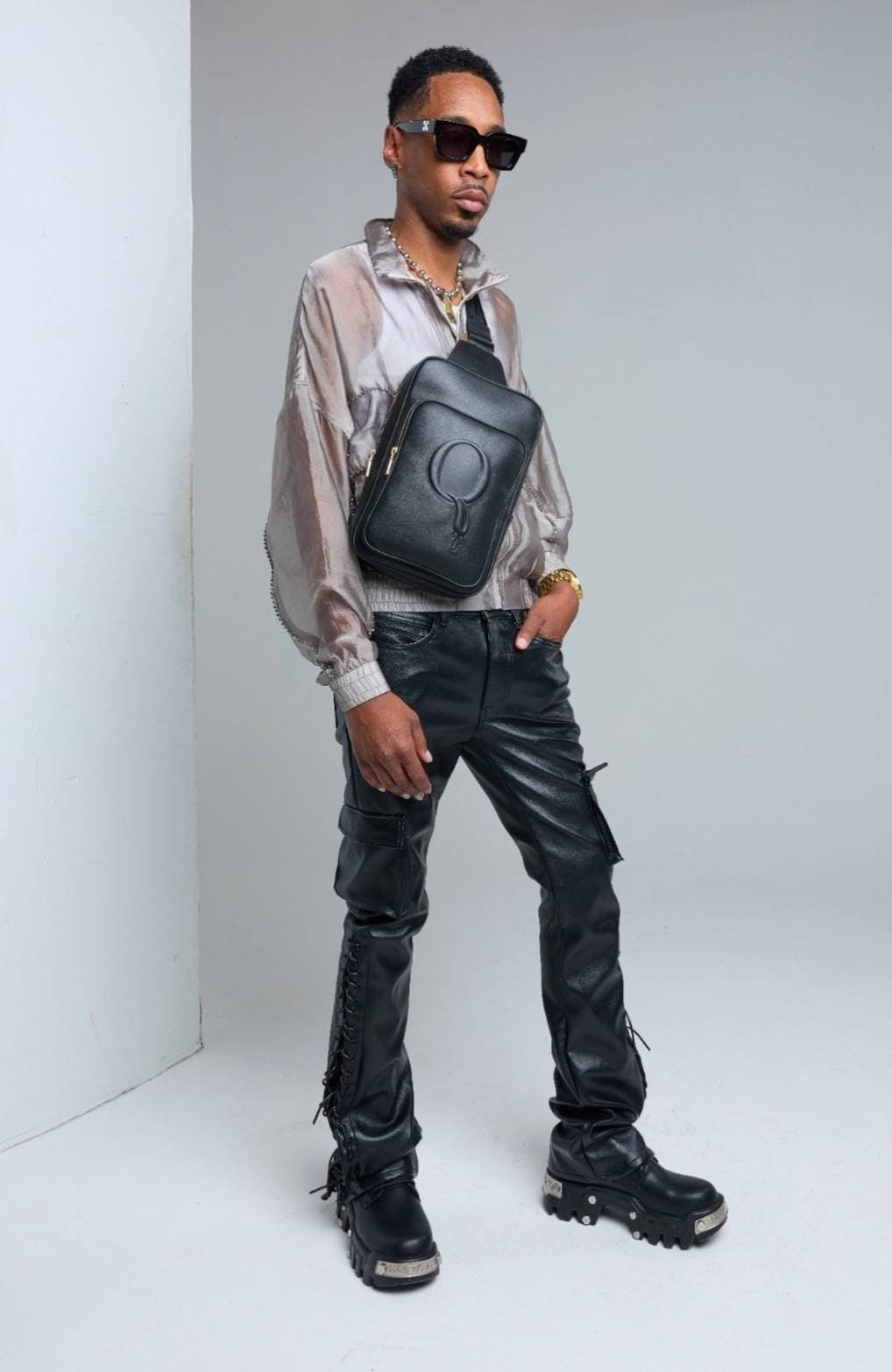 Full look — Statement Sling with sheer jacket and platform boots