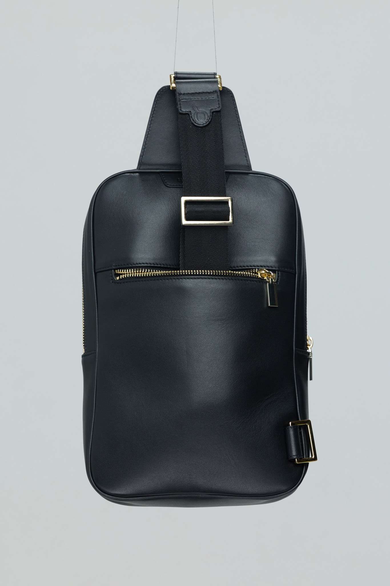 Statement Sling front view with gold hardware